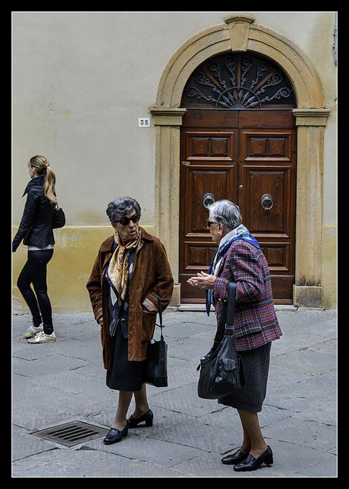 These properly dressed matrons contrast markedly with their younger, hip contemporary.Pienza, Tuscany.