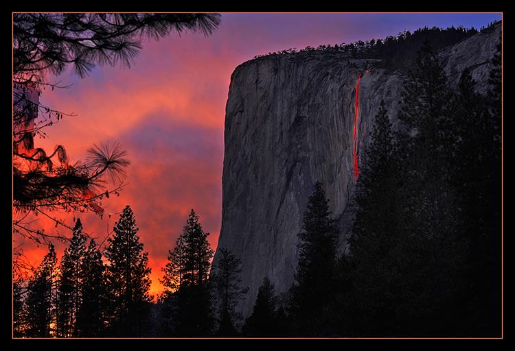 At 5:43 p.m. on February 13, 2014 (after official sunset) sunlight breaks through cloud cover at the western horizon to produce the stunning "Firefall" effect on Horsetail Fall, located at the eastern edge of majestic icon El Capitan while seemingly setting the sky ablaze at the same time.