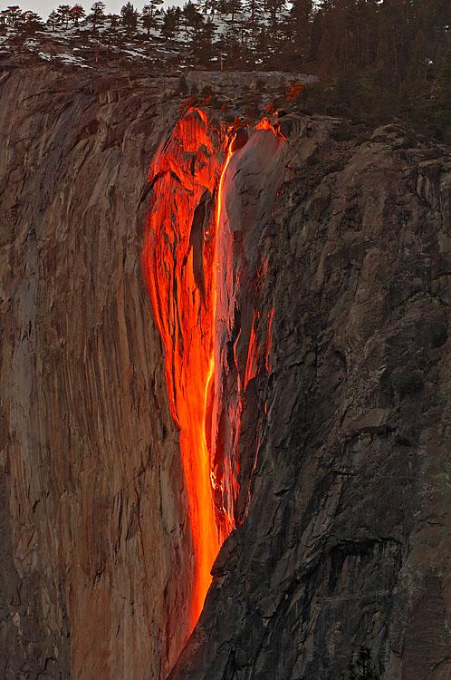 Horsetail Fall 'Fire Fall'  - No.2128<br />Warm red wavelength light near the western horizon casts a rich glow along the rock face of El Capitan and the wispy ephemera of Horsetail Fall.