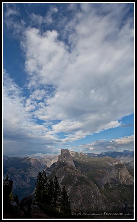 From Washburn Point<br />While unstable weather rolled into the area I thought conditions might provide some spectacular photo ops for lightning strikes, sunset colors, etc. Alas, it wasn't to be.Hoping that the current weather pattern would bring a stunning sunset to Yosemite and environs, I drove to Glacier Point on Friday in anticipation, stopping first at Washburn Point to make this photograph.While heavy overcast at the horizon did not make for a photographer's dream sunset, this cloud formation above Half Dome late in the afternoon made a satisfying consolation prize.